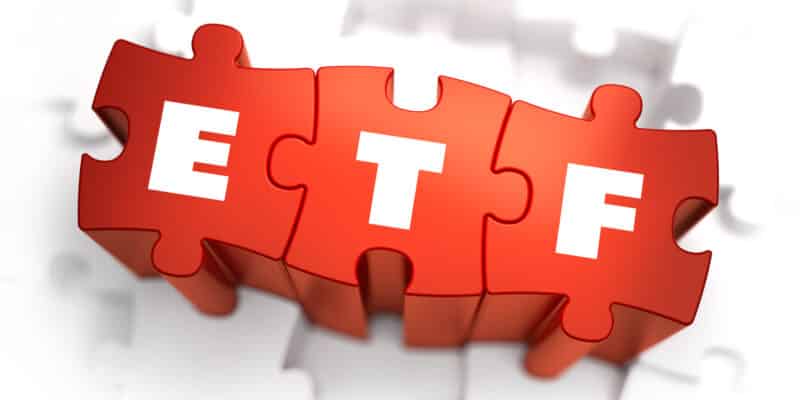 ETF - Exchange Traded Fund - Text on Red Puzzles with White Background. 3D Render.